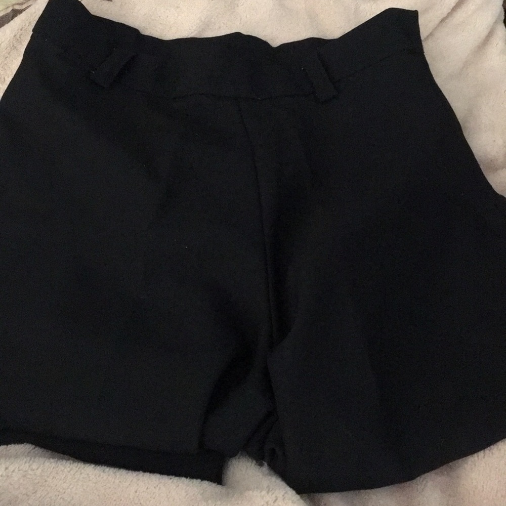 Small black showmanship pants.